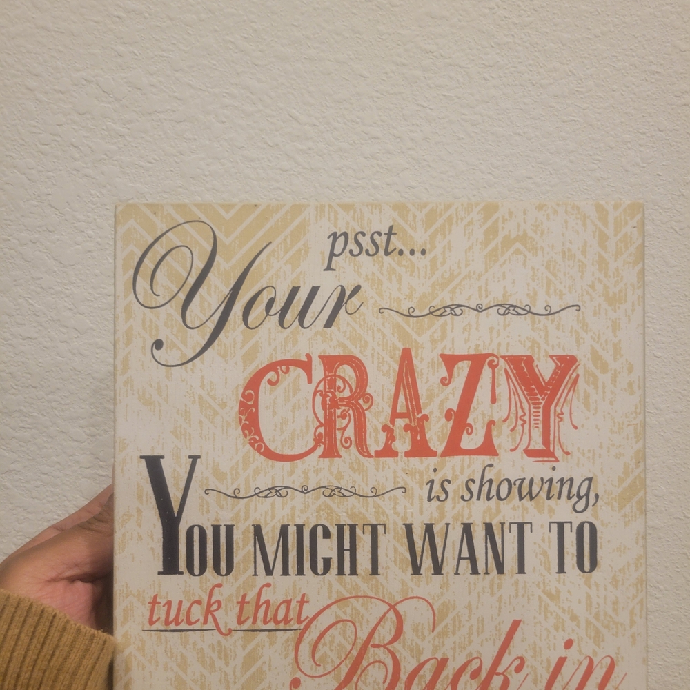 Decorative Wall Art with Red and Black Text